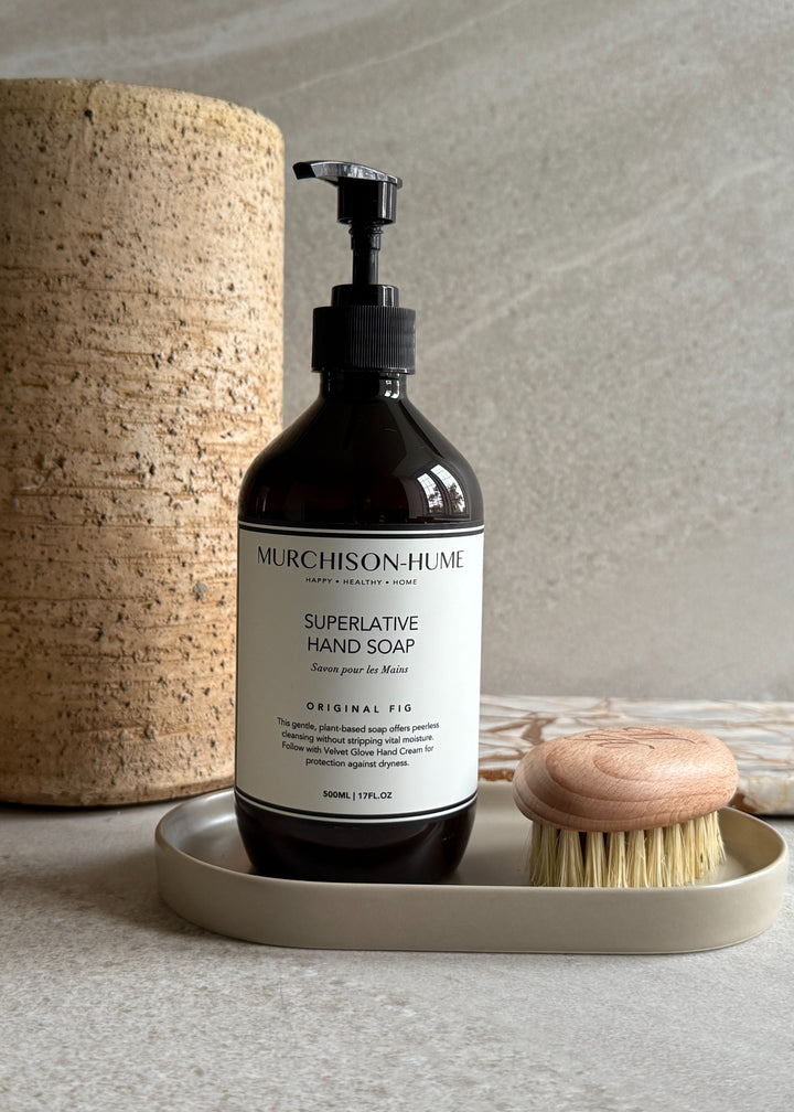 Murchison-Hume Superlative Hand Soap bottle on tray with nail brush.