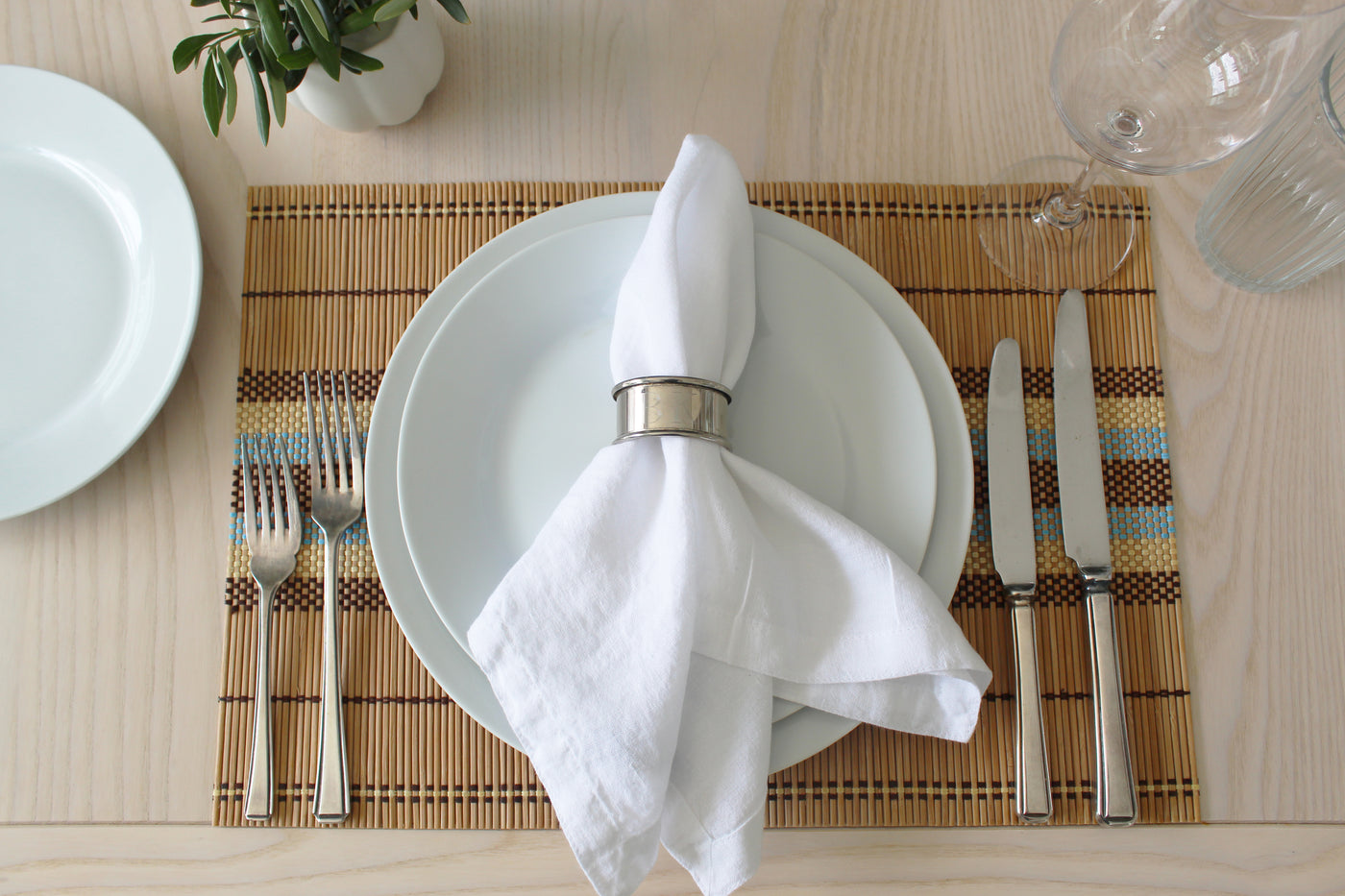 white linen napkin on plate
